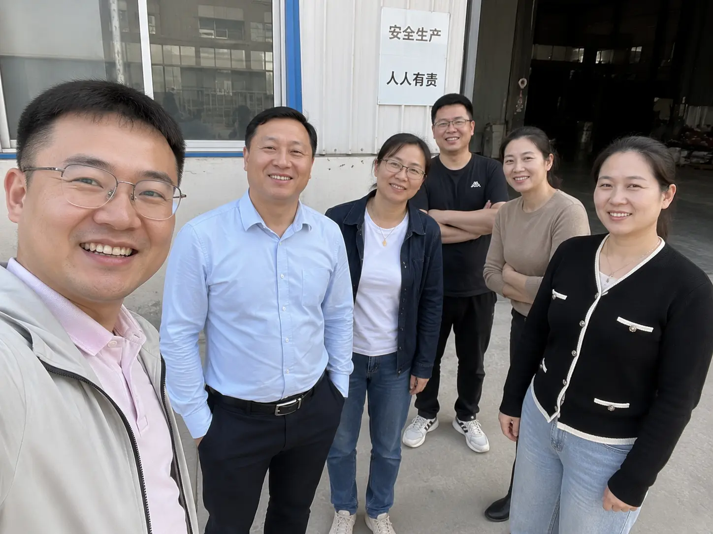PackTonne sourcing and export team standing together at the factory