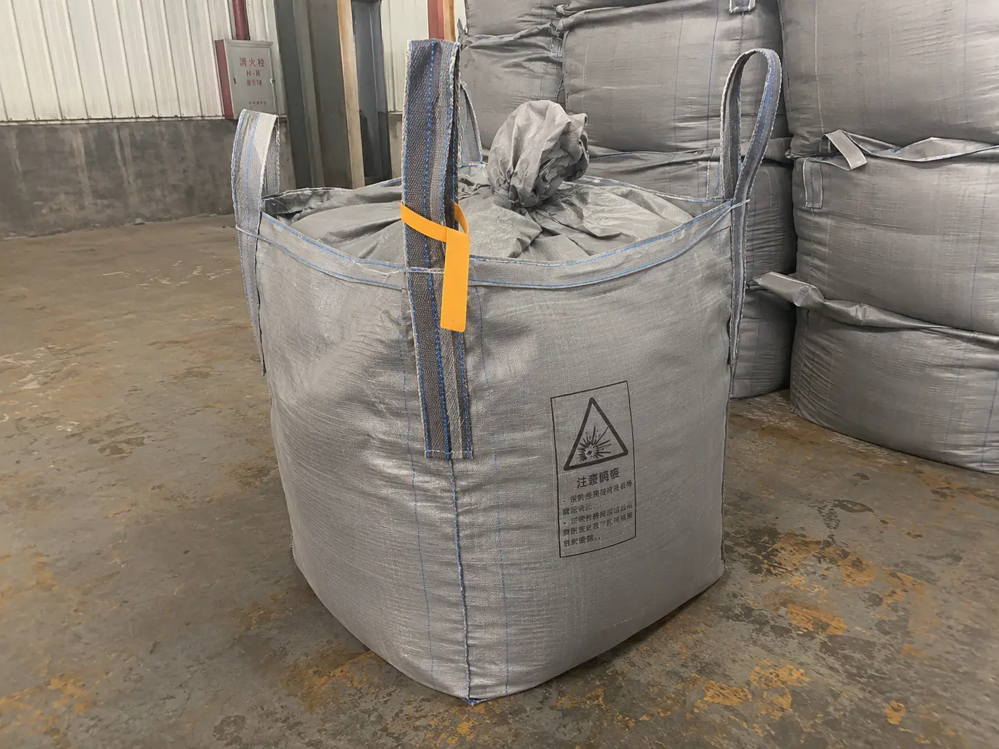 Type C conductive anti-static FIBC bag with grounding tab for flammable powder handling
